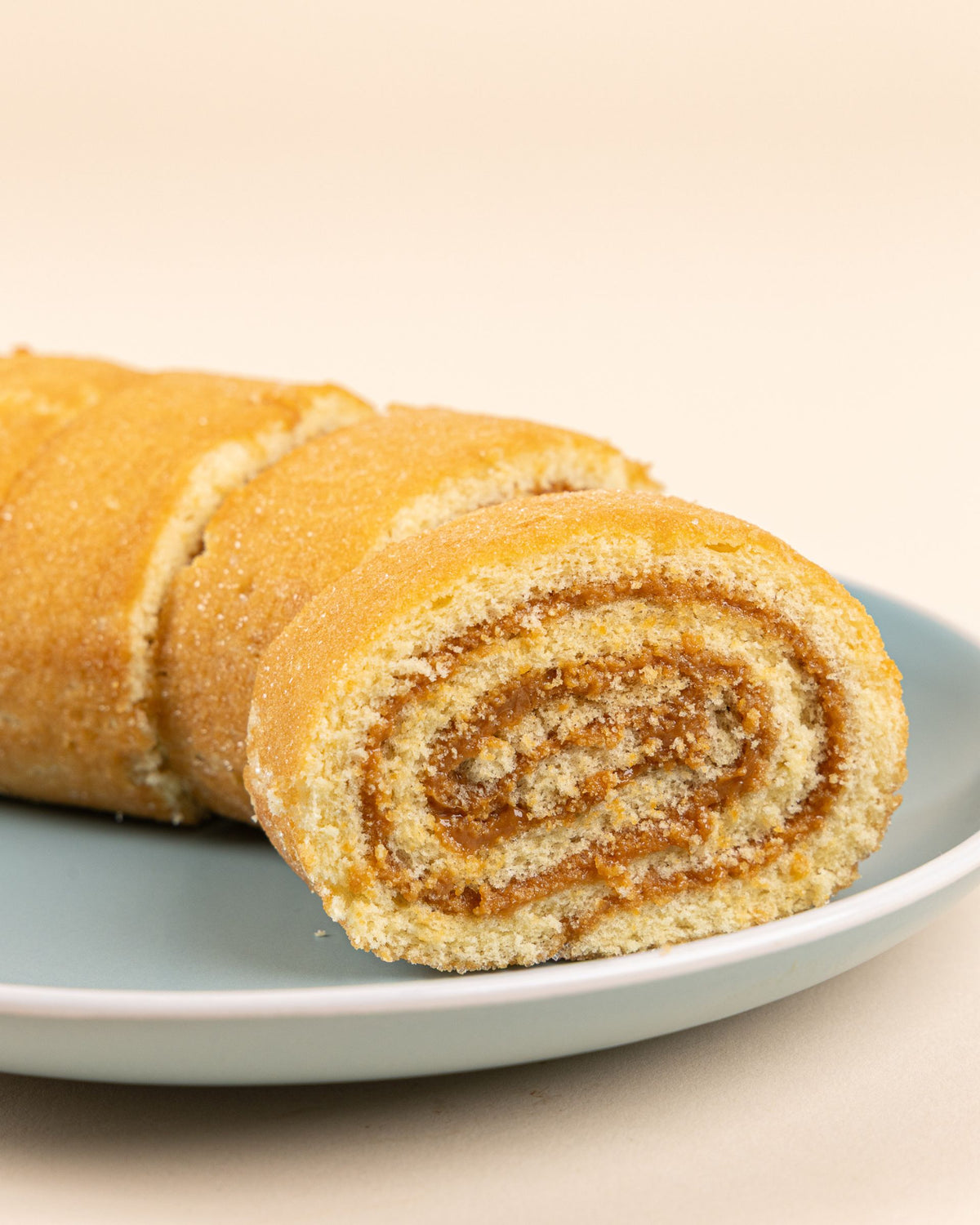 Brazo gitano de manjar (porción)